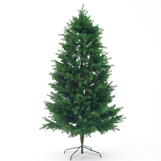 Green artificial Christmas tree with stand