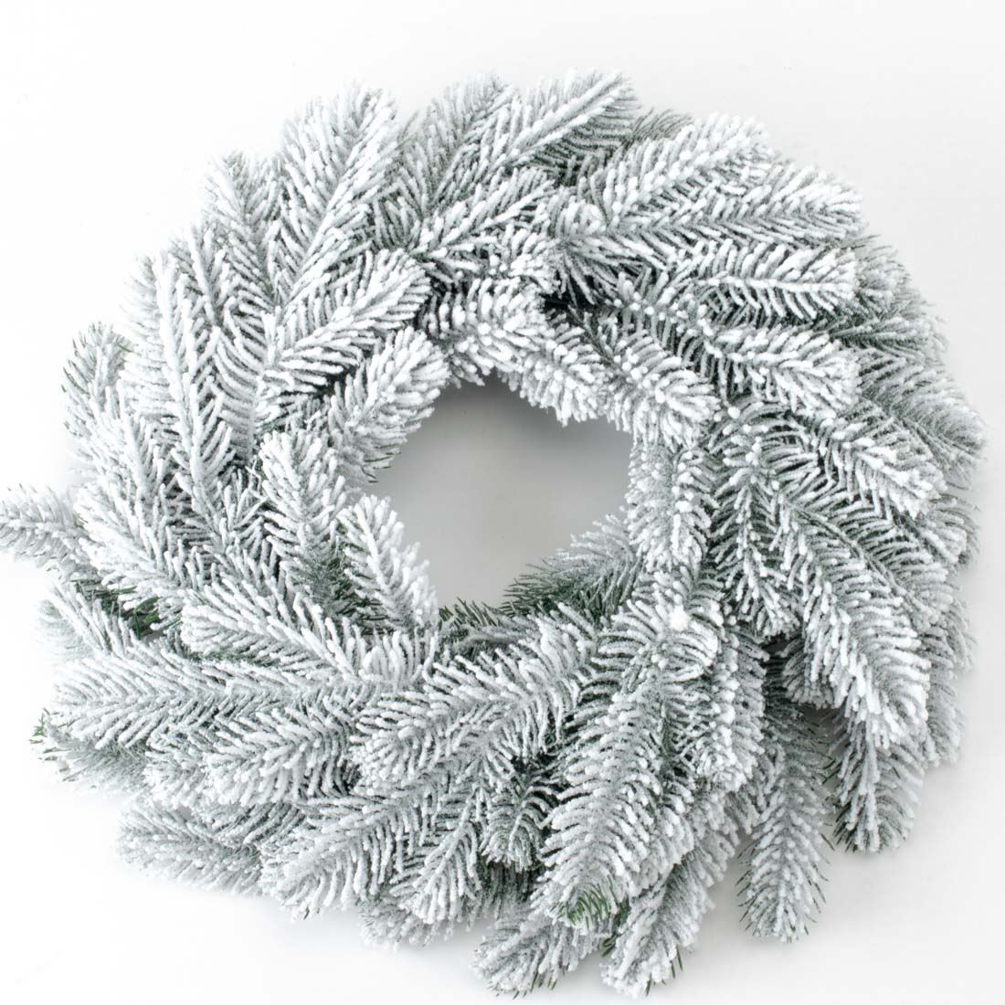 Plastic winter wreath with snowy effect
