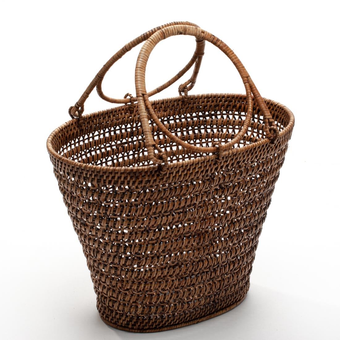 This handmade rattan bag is a piece of natural elegance