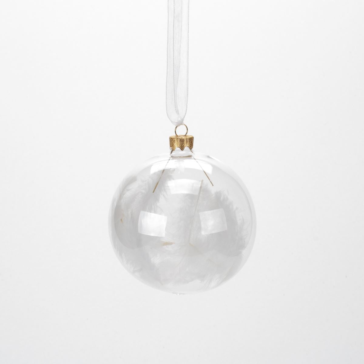 Transparent glass ball with white feathers inside for a Christmas tree